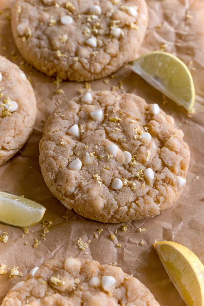 lemon and white chocolate cookies on a parchment paper