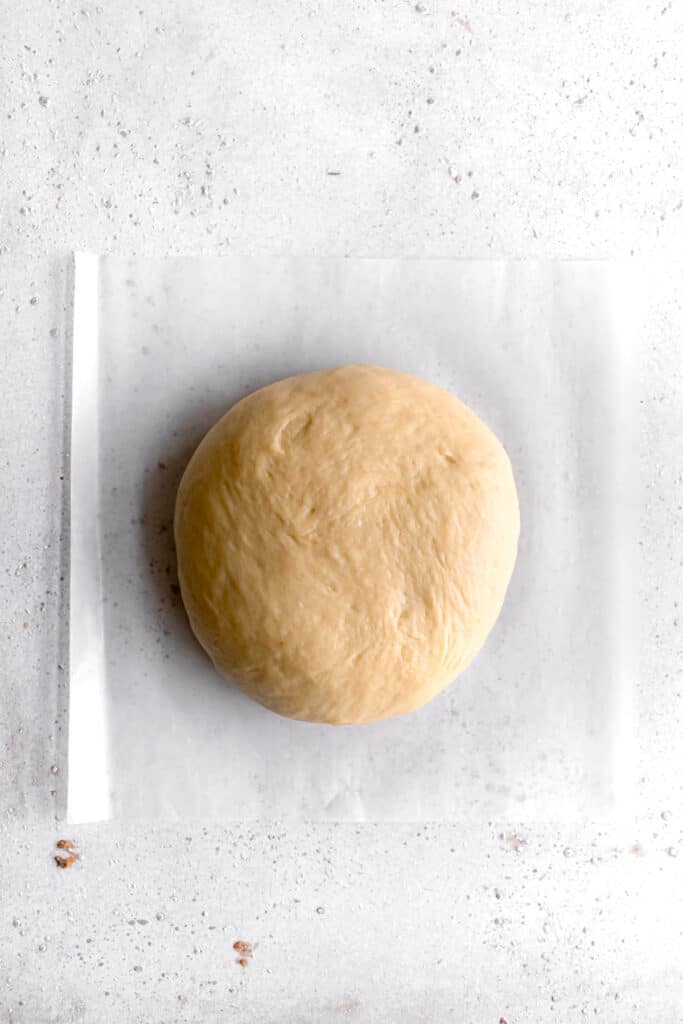 yeast dough for star bread on a parchment paper